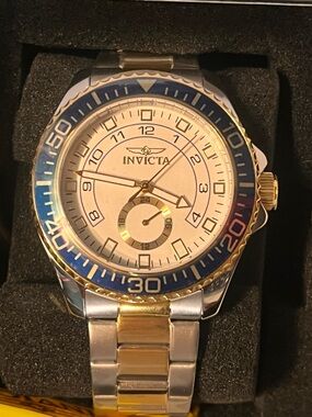 Invicta Two-Tone Watch with Blue Bezel and White Dial